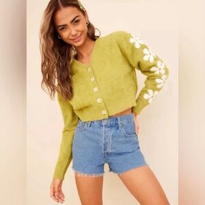 Levi’s green daisy sleeve crop sweater